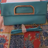 Borsa celeste con dettagli in oro Primadonna