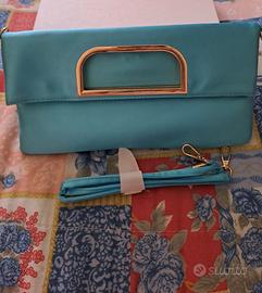 Borsa celeste con dettagli in oro Primadonna