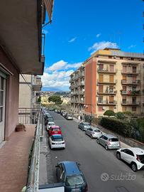 Tre vani con posto auto viale M Rapisardi