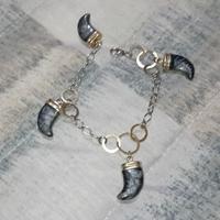 Bracciale in argento bicolore e corni smaltati