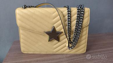 Borsa a tracolla con catena e stella 