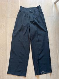 Pantaloni neri eleganti con due bottoni