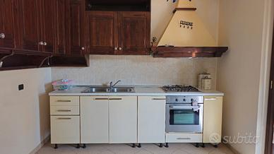 pensili cucina e divano