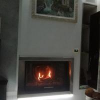 camino  a legna ad aria  palazzetti angolare sx