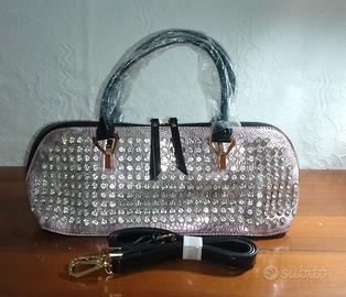 Borsa a mano e tracolla rosa con strass