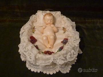 Bambino Gesù con fiori in cera