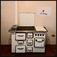 Cucina/stufa a legna + 2 spazi per piastra elettr.