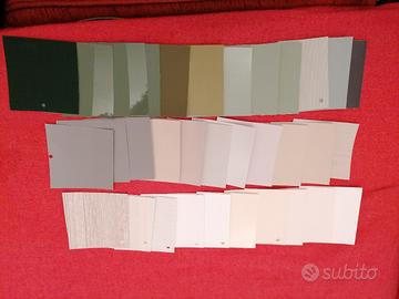 35 cartoncini adesivi con diversi colori e texture