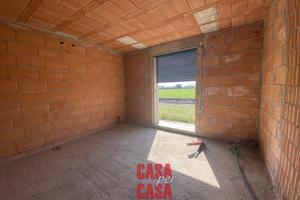 porzione di bifamiliare con giardino