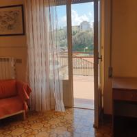 Ampie camere in appartamento condiviso