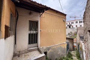 Casa con giardino in centro città