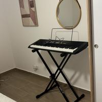 tastiera okey 61 + libro pozzoli+ cavalletto