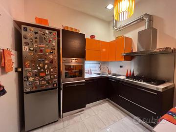 Cucina ernesto meda arancio e wengé