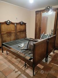 armadio e letto antico con finiture in ferro 800
