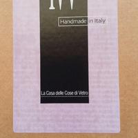 Sottopiatti con bordo in argento