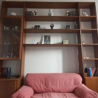 libreria a ponte con divano letto