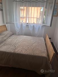 Letto matrimoniale con doghe in legno