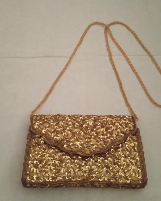 Pochette da cerimonia oro con paillette corallini 