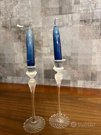 Coppia di candelabri con candela