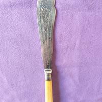 Antico coltello da pesce argentato