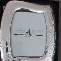 Cornice in argento mai usata