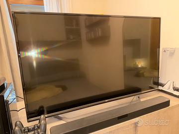 LG 49” 4K Smart TV + Soundbar + Subwoofer wireless