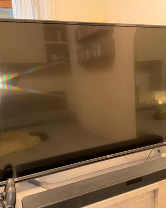 LG 49” 4K Smart TV + Soundbar + Subwoofer wireless