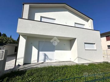 PORZIONE DI BIFAMILIARE A FONTE