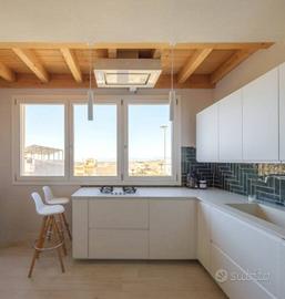 Bifamiliare di design con terrazza panoramica