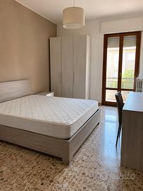 Spaziosa camera singola con letto matrimoniale