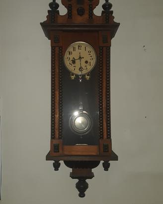 Orologio antico da parete a pendolo in legno