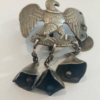 Amuleto rituale-Aquila in argento con campanelle