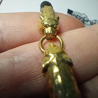 bracciale tigri oro giallo 18kt pelle nera