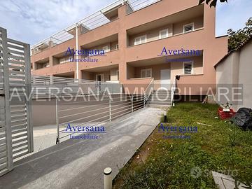 Ville a schiera con solarium