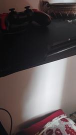 ps3 con giochi controller e cavi