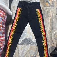 Jeans neri con disegno fiamme us 30 fr 40