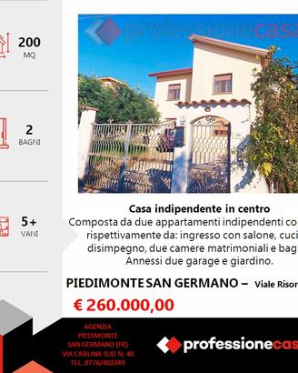 Casa indipendente in centro con giardino+2box