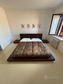 letto in legno massello compreso di materasso