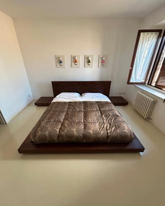 letto in legno massello compreso di materasso