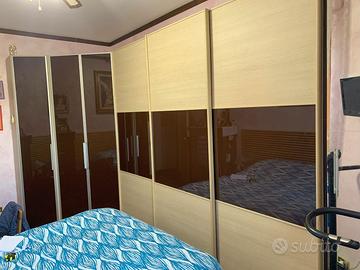 GUARDAROBA  ANTE SCORREVOLI +ANGOLARI E CASSETTIER