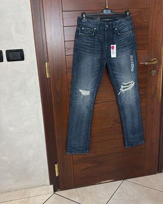 Jeans Guess uomo strappati tg 42 e 44