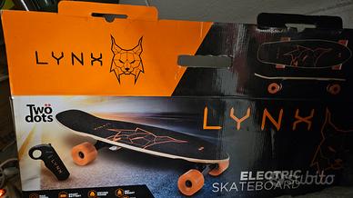Lynx electric skateboard arancione e nero 