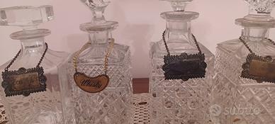 Quattro bottiglie per liquori vintage 