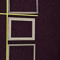 Tre cornici in legno intarsiato