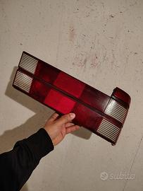 Alfa 75 fanale rosso e due paraurti 