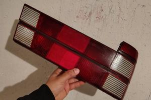 Alfa 75 fanale rosso e due paraurti 