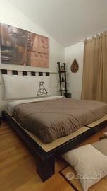 Letto giapponese, con tatami e cuscino 