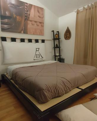 Letto giapponese, con tatami e cuscino