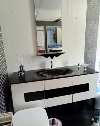 Mobile top vetro con lavabo integrato