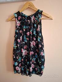 Blusa trasparente a fiori 